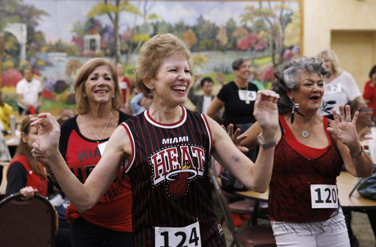 Jan Zartman-Cahill, center, and Amalia Bauza, right, dance during the HEAT Golden Oldies auditions for the Miami Heat senior dance team on Thursday, Sept. 25, 2025, at Southwest Focal Point Community Center in Pembroke Pines, Fla.