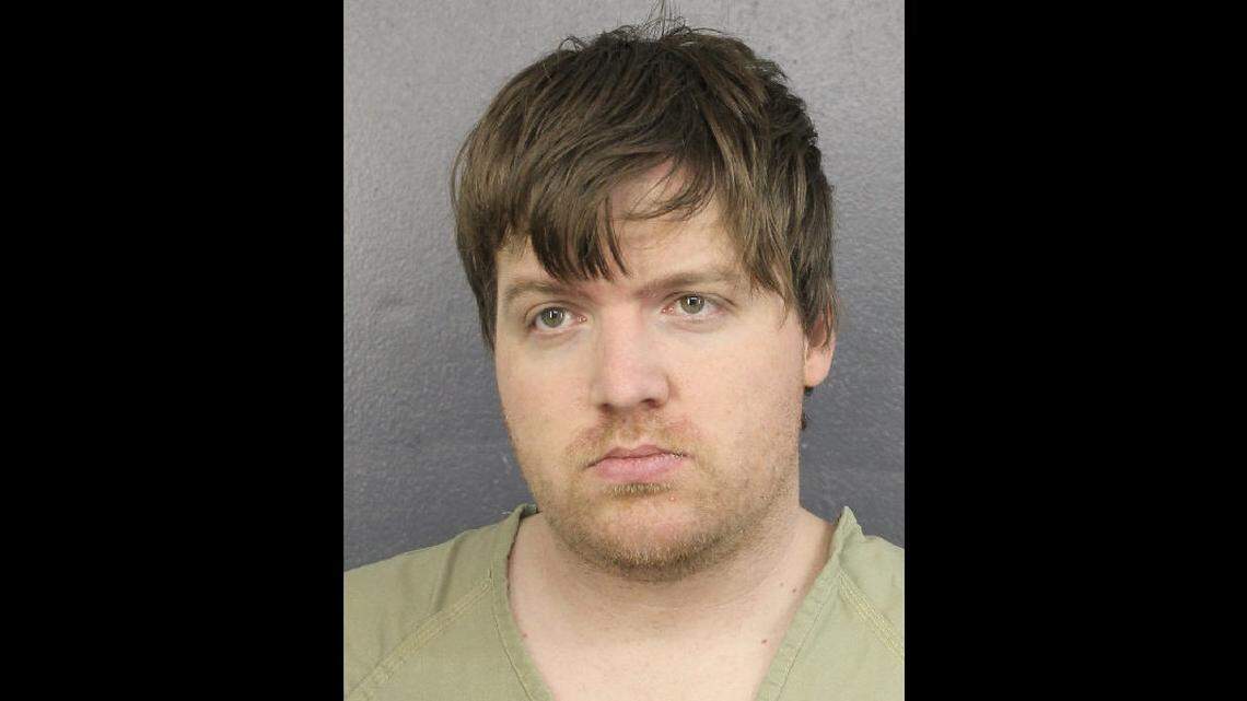 Ex-coach of St. Thomas Aquinas hockey club charged with child porn