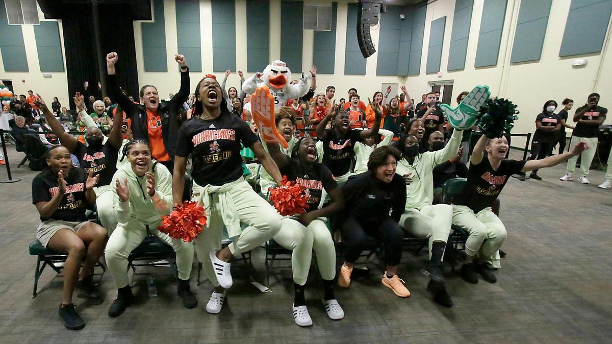 UM Hurricanes women’s basketball team reacts to the announcement during the Selection Sunday watch party to find out their fate in the NCAA tournament. Andrew Uloza / for THE MIAMI HERALD