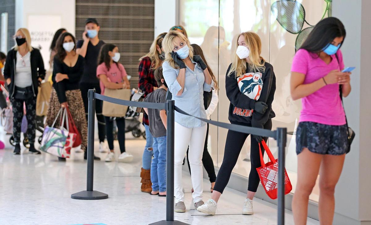 Sharon and Abbie Wolfe outside ZARA at Aventura Mall, May 25, 2020. The mall was an alternative to traditional Memorial Day activities as rain inundated the area.