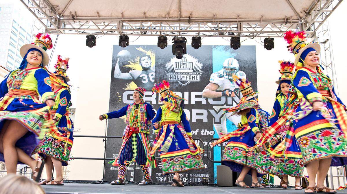 At a previous CultureFest 305 at HistoryMiami, Bolivian dancers performed on stage in colorful costumes.