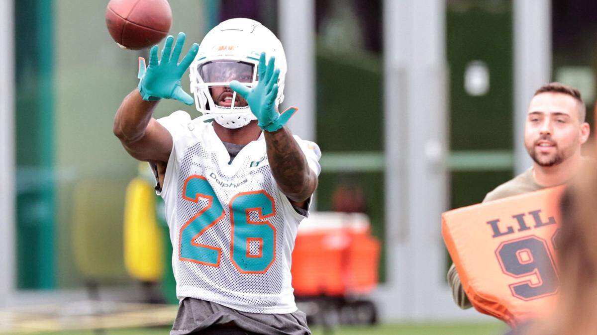 Miami Dolphins running back Salvon Ahmed (26) catches a pass during practice drills at the Baptist Health Training Complex in Miami Gardens on Wednesday, January 5, 2022.