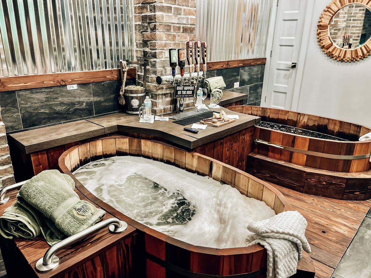 Sip craft beer while soaking in a warm beer-infused spa bath.