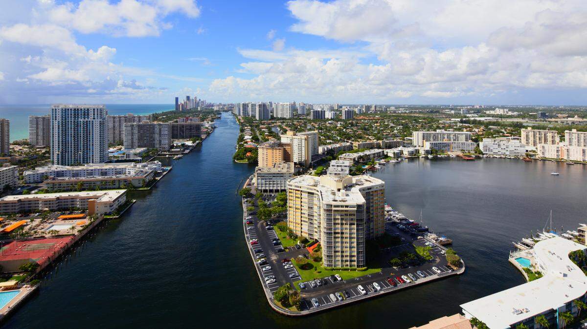 Aerial photo of Hallandale Beach, Florida. A Hallandale Beach president of a co-op building has been hit with a restraining order after being caught on camera verbally abusing a resident, Local 10 News reported.