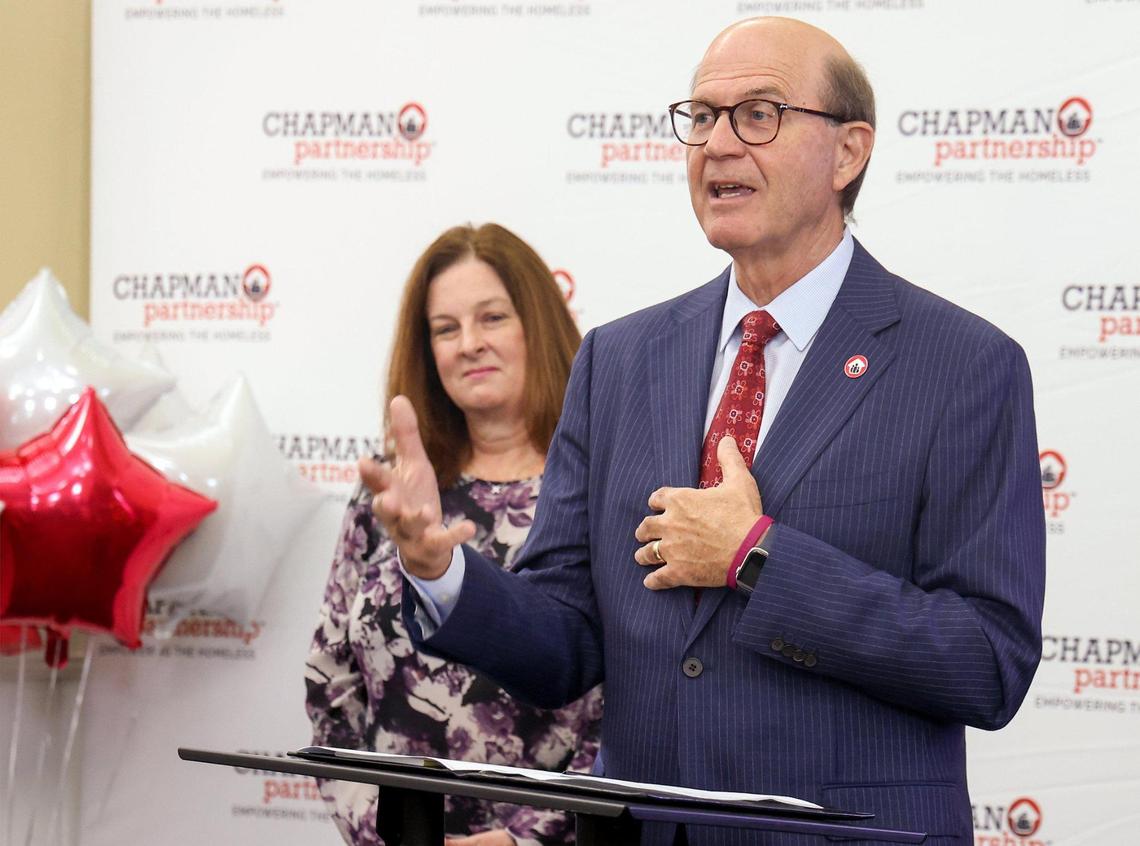 Peter T. Pruitt, president and CEO of the Chapman Partnership, announces on Tuesday, Nov. 22, 2022, in Miami that the organization has received $5 million from this year’s Bezos Day 1 Families Fund grant. On the left is Victoria L. Mallette, the executive director of the Miami-Dade County Homeless Trust.