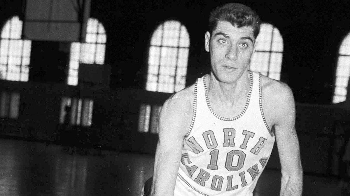 FILE - North Carolina basketball star Lennie Rosenbluth is shown during a practice session Feb. 27, 1957, location not known. Rosenbluth, who led North Carolina to its first basketball NCAA title in 1957 with a victory over Wilt Chamberlain and Kansas in the championship game, died Saturday, June 18, 2022. He was 89. (AP Photo/File)