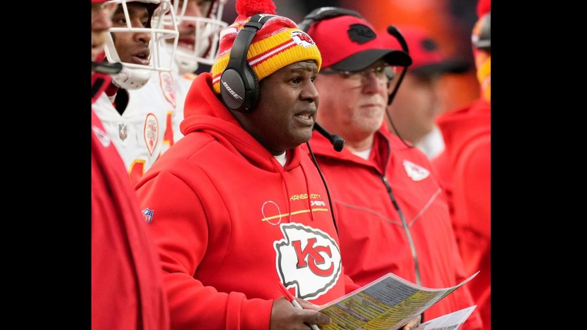 Kansas City Chiefs offensive coordinator Eric Bieniemy works against the Denver Broncos in an NFL football game on Saturday, Jan. 8, 2022, in Denver.