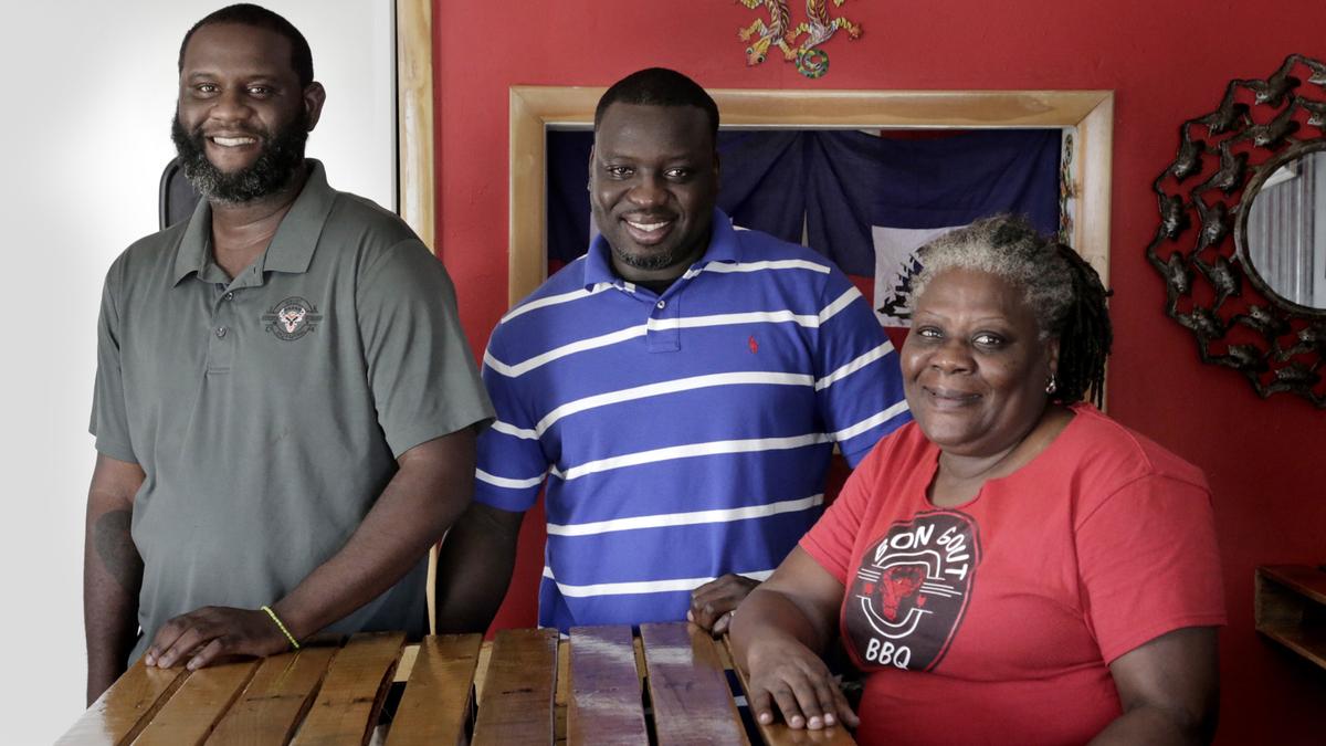 Miami, June 11, 2019 - Jean Lucel (left), Wesley Bissaint (center) and his mother Miselie Marseille (right) at Bon Gout Barbecue, 99 NW 54th St, Little Haiti