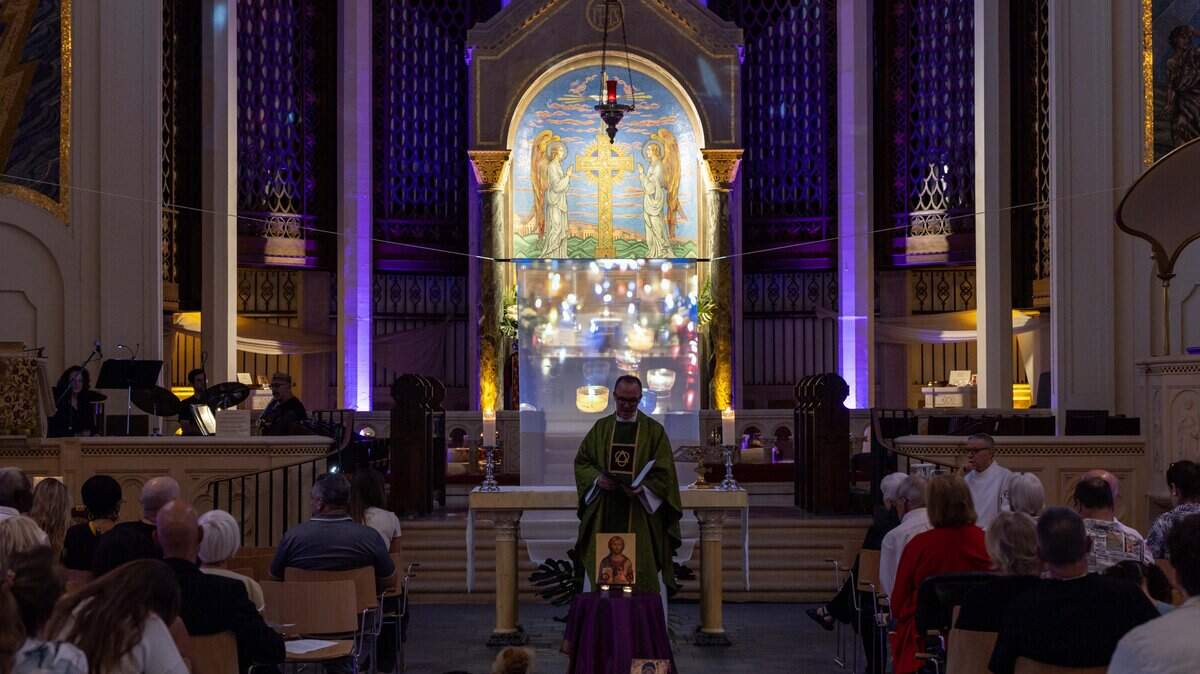 The Very Reverend Jason Roberson gives the sermon at Trinity Episcopal Cathedral during Vox Dei, a new interactive service of Holy Eucharist, on Sunday, September 7, 2025, in Miami, Fla. Trinity Episcopal Cathedral is celebrating the centennial anniversary of the church.