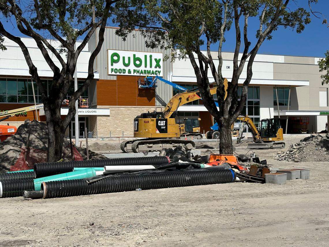 Construction crews work on the storefront of a new build Publix set to replace an old store at the Briar Bay Shopping Plaza across the street from The Falls in South Miami-Dade on Nov. 1, 2024. The mall anchor store, which will be two stories and about 53,000 square feet, is at 13005 SW 89th Place.
