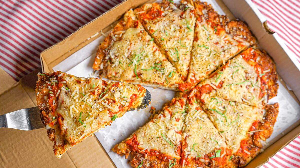 Chicken parm pizza is one of the many Italian offerings on the menu of Mamma Parmigiana, the new delivery-only concept from Miami chef Nicole Votano.