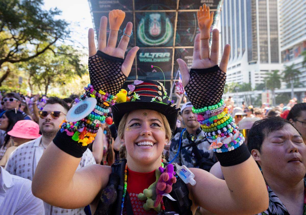 Maggie Dignan puts her hands up at Ultra Day 3 during ARMNHMR’s set on Sunday, March 24, 2024, at Worldwide Stage inside Bayfront Park in downtown Miami.