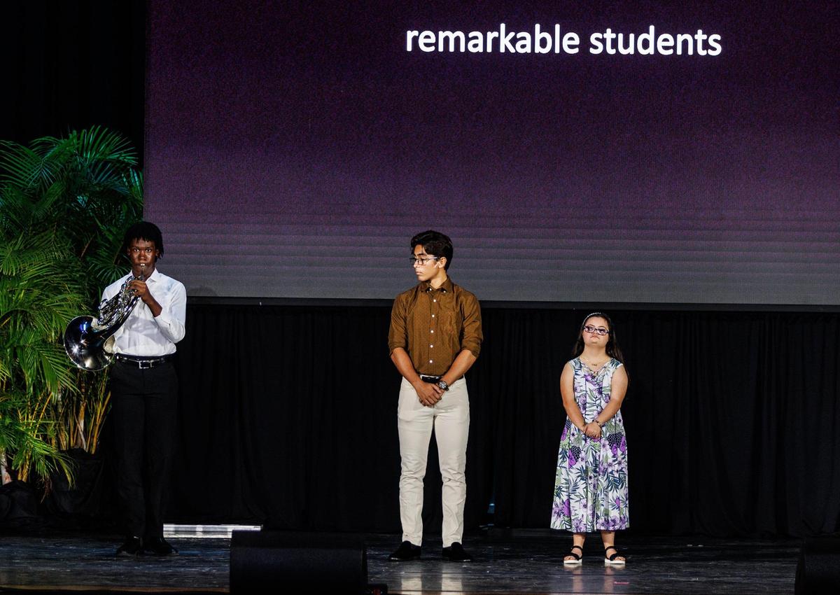 Miami-Dade Schools superintendent Jose Dotres recognizes the top students of the year from left- Emmanuel Alexander Jeancelamy, of Norland Senior High School; Fabio Tinoco, of Coral Gables Senior High; and Kelly Carrazana, South Dade Senior High, during the Miami Dade County Public Schools District 2023- 2024 Opening of Schools event at Miami Senior High School in Miami, on Friday, Aug. 11, 2023.