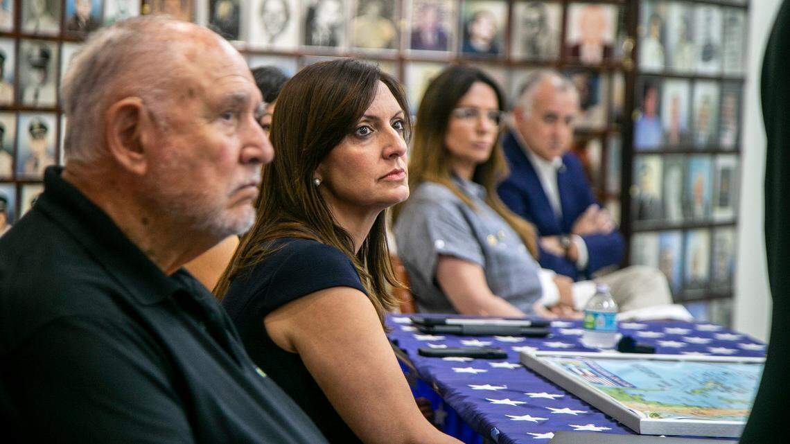 Brigade 2506 President Rafael Montalvo sits next to Lt. Gov. Jeanette Nuñez, as she joined leaders from the Cuban-exile community during a press conference to announce their opposition to the sale of Radio Mambi and WQBA, La Cubanisima, to the newly formed Latino Media Network.