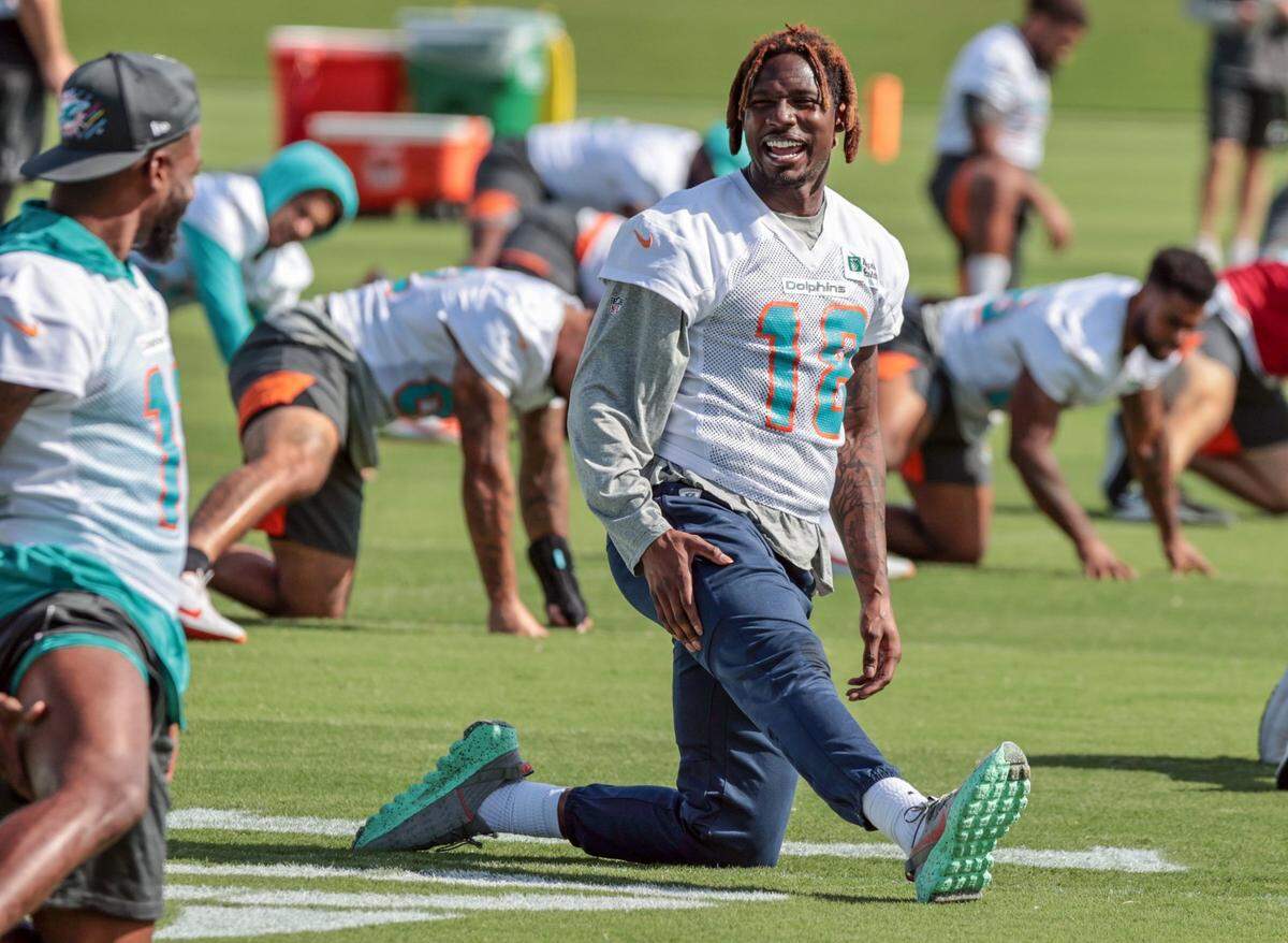 Miami Dolphins wide receiver Preston Williams (18) talks with wide receiver DeVante Parker (11) during practice at Baptist Health Training Complex in Miami Gardens on Sunday, December 08, 2021. ( Al Diaz Photo / Miami Herald )