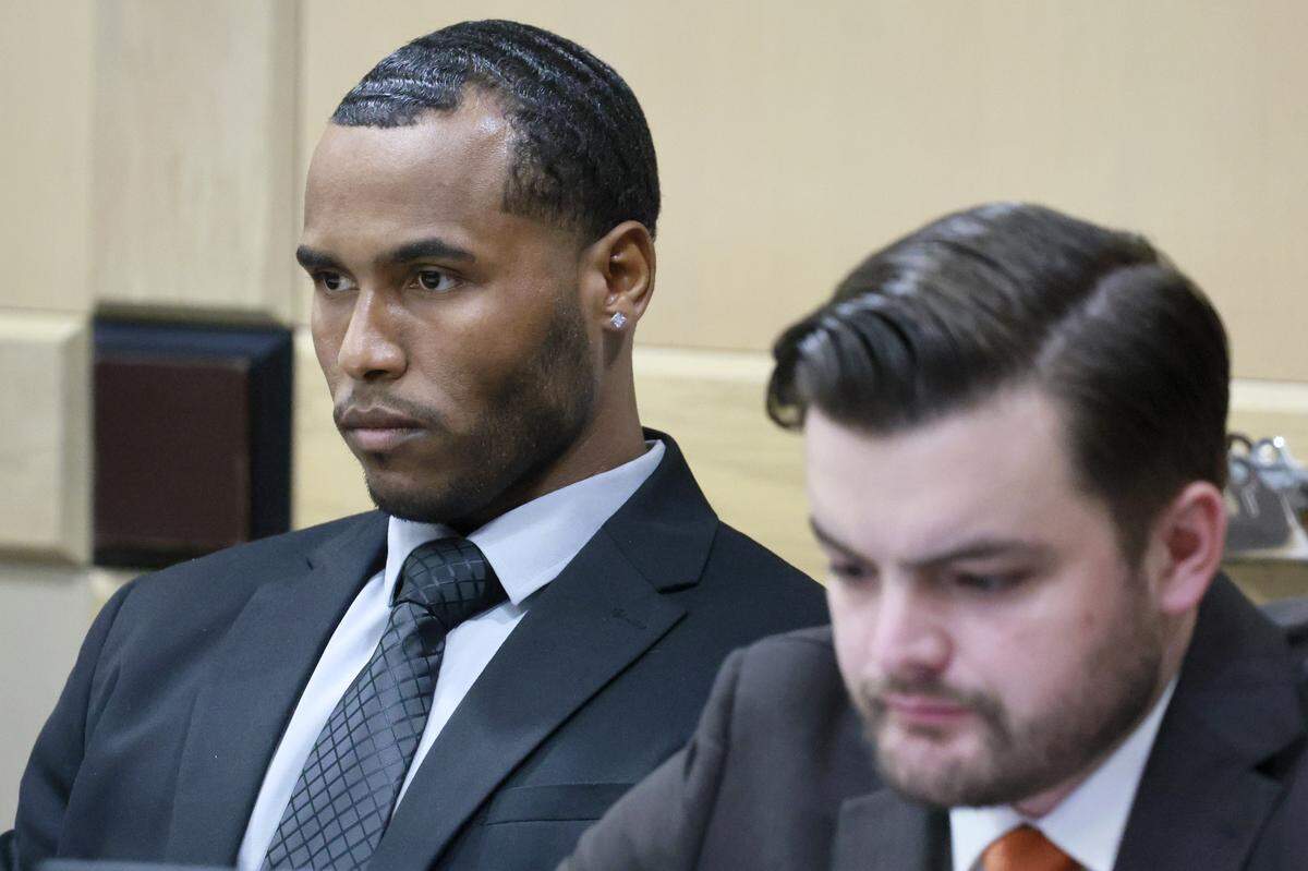 Defendant Jose Mateo with his lawyer Carlos Salazar argues Florida’s stand-your-ground statute before Judge Ernest A. Kollra on Friday, Aug. 22, 2025. Mateo is one of four Miami-Dade officers charged with manslaughter in the case stemming from the death of UPS driver Frank Ordonez, who was shot by police during a shootout with his kidnappers. 