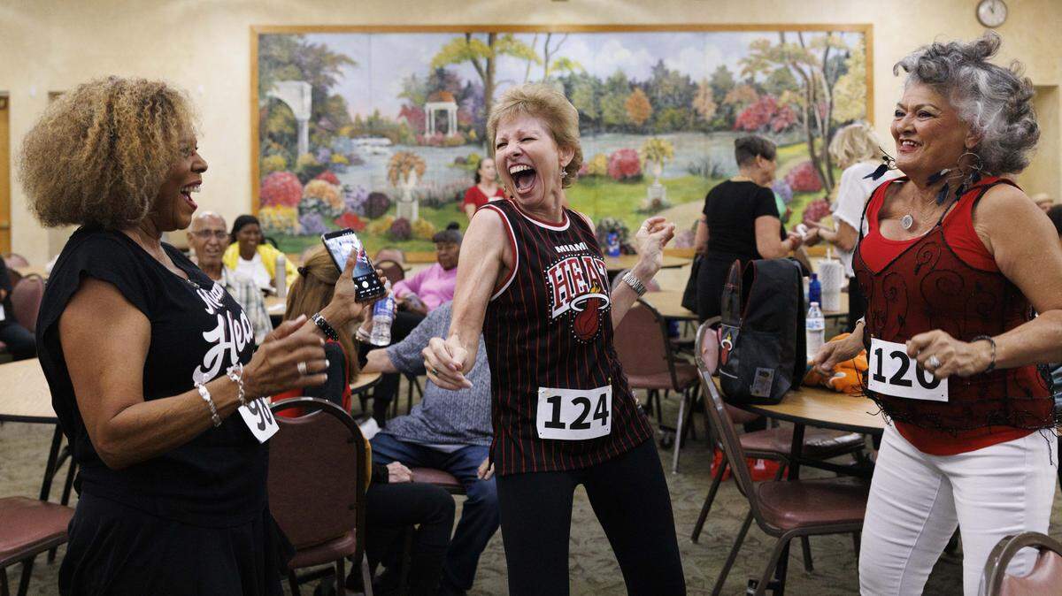 Barbara Sanders, left, Jan Zartman-Cahill, center, and Amalia Bauza dance during the HEAT Golden Oldies auditions for the Miami HEAT senior dance team on Thursday, Sept. 25, 2025, at Southwest Focal Point Community Center in Pembroke Pines, Fla.