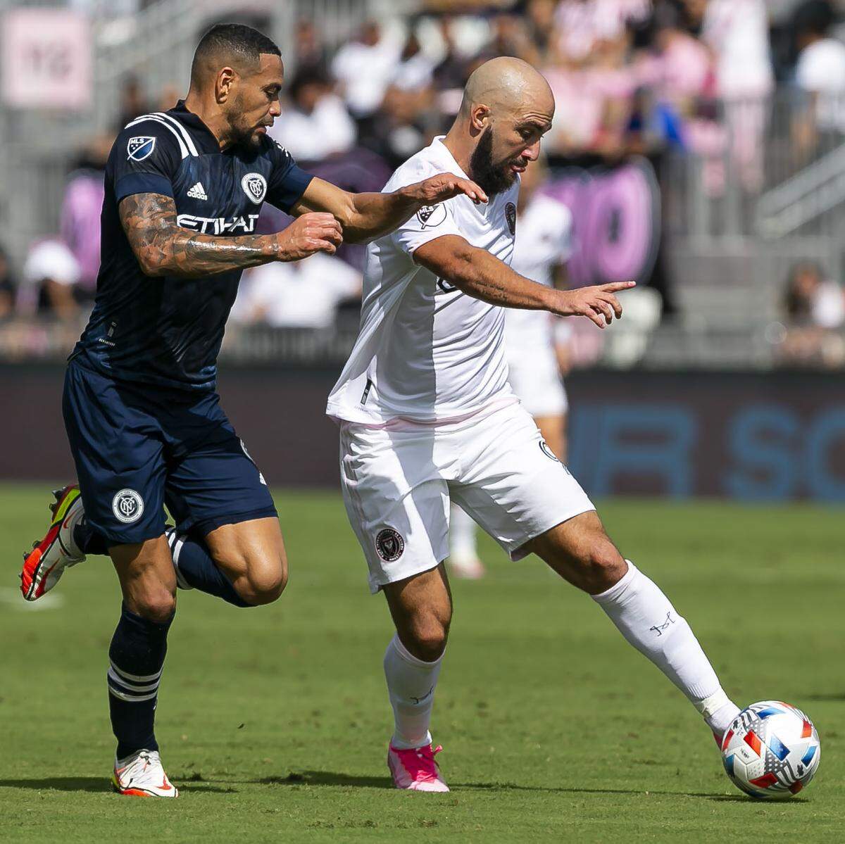 Inter Miami forward Gonzalo Higuain (9) fights for possession of the ball against New York City FC defender Alexander Callens (6) during the first half of their MLS soccer match at DRV PNK Stadium on Saturday, October 30, 2021, in Fort Lauderdale, Florida.