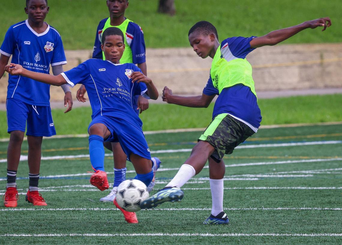 Little Haiti FC soccer players scrimmage during practice at the Little Haiti Soccer Park in Miami.