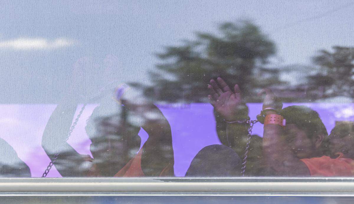 Buses carrying detained immigrants depart from Alligator Alcatraz at the Dade-Collier Training and Transition Airport on Friday, Aug. 22, 2025, in Ochopee, Fla. A federal judge has ordered the immigrant detention center to close within 60 days.
