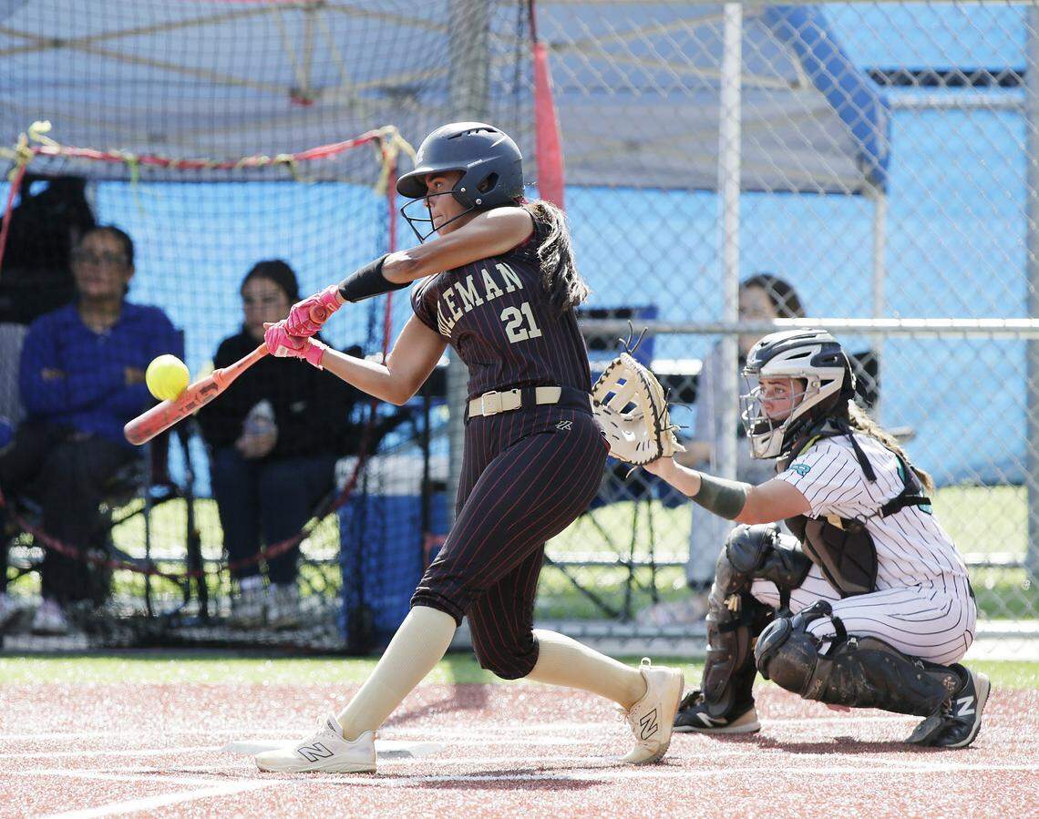 Goleman Gators Nicole Regalado (21) bats against Coral Reef Barracudas during GMAC softball championship game on Friday, April 17, 2026 at JC Bermudez HS in Doral. Andrew Uloza / for Miami Herald