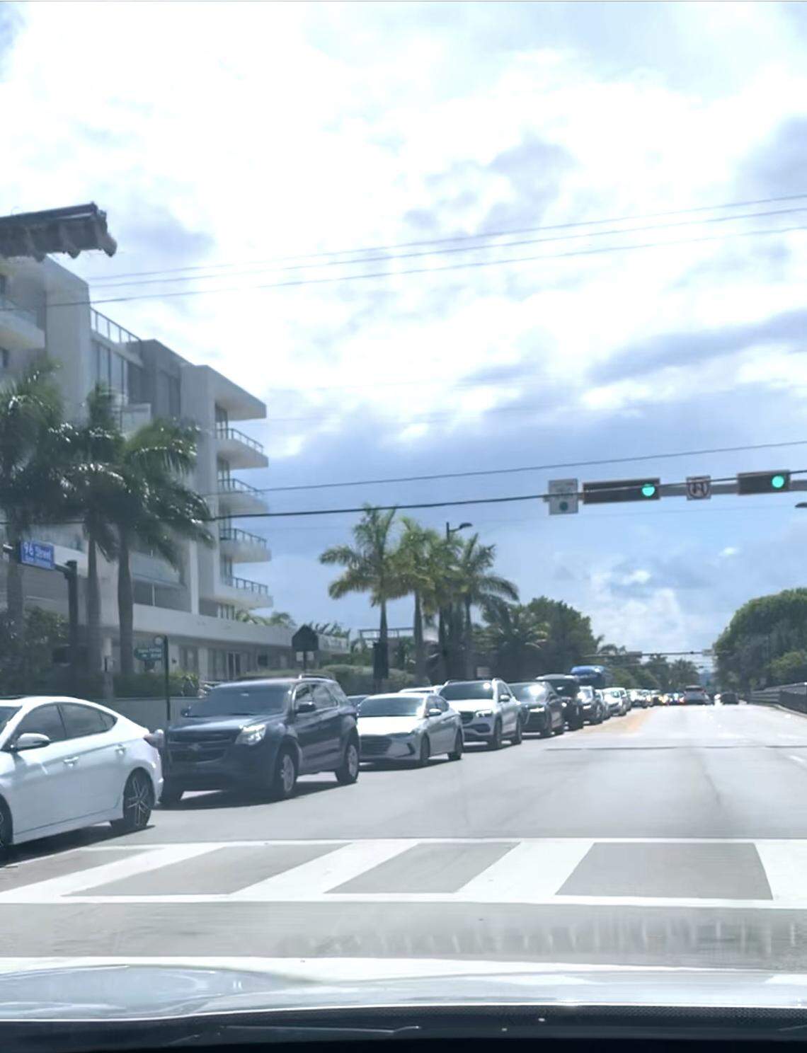 A line of cars stretches from Surfside to the Broad Causeway Saturday afternoon, May 14, 2022, after a plane crash landed atop a Haulover bridge.