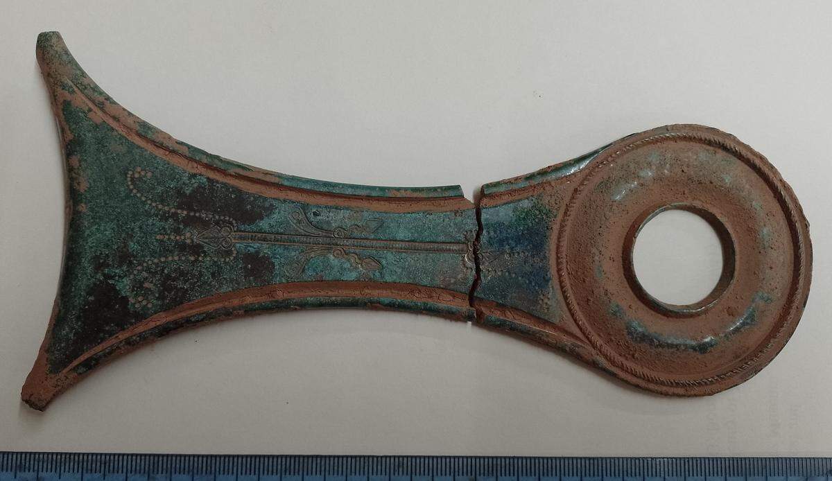 The handle of an ancient Roman saucepan.