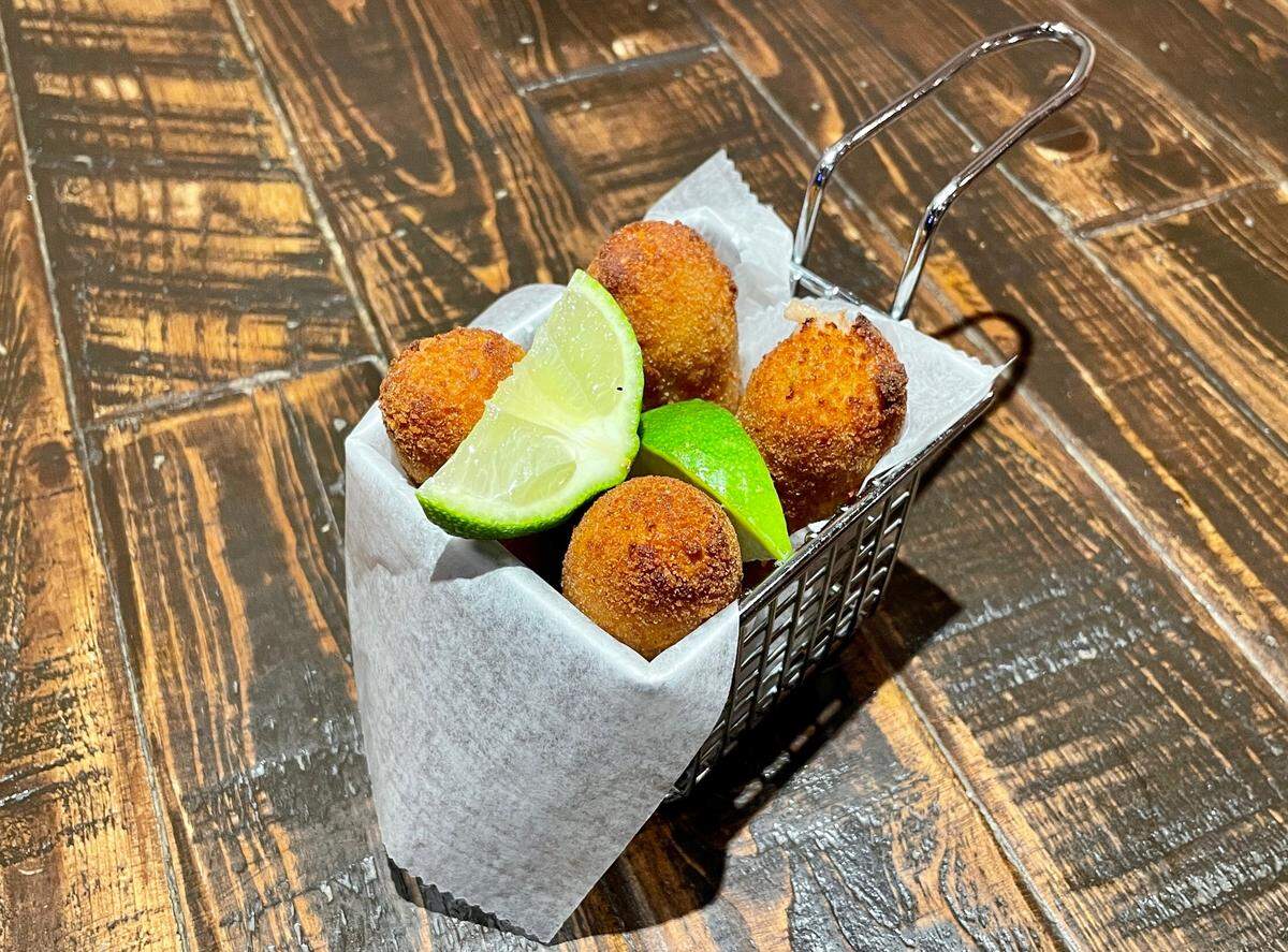 Smoked gouda and ham croquetas at Smoke & Dough in west Kendall
