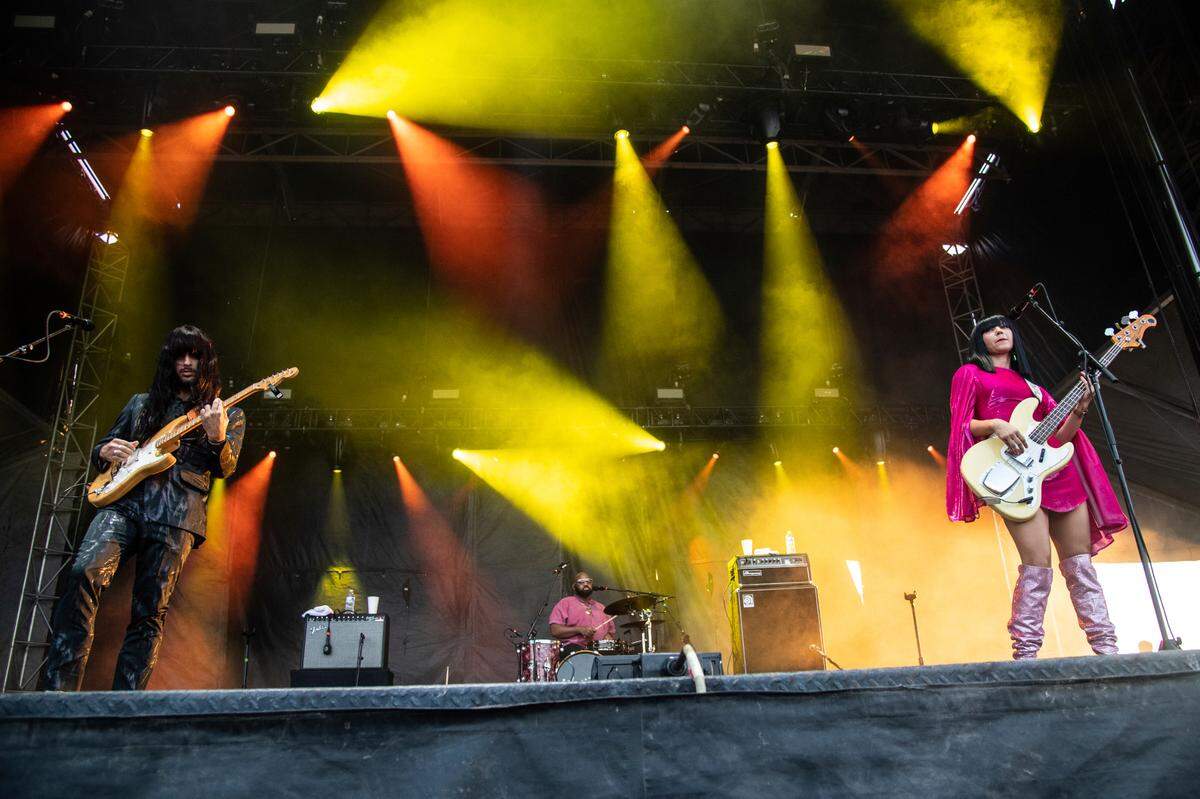 From left, Mark Speer, Donald Ray DJ Johnson Jr., and Laura Lee, of Khruangbin, perform at the Railbird Music Festival on Sunday, Aug. 29, 2021, in Lexington, Ky.