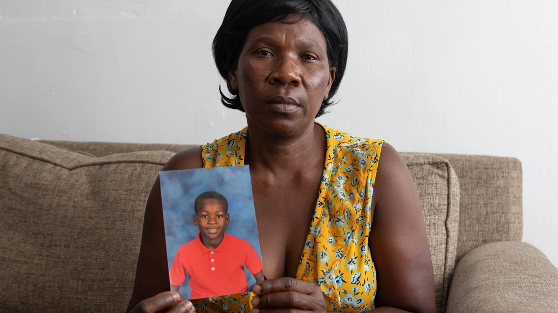 Figenie Dugard, mother of Ryan Amichette, with Ryan’s second-grade yearbook photo on Thursday, June 6, 2024 ,in Fort Lauderdale, Fla. Ryan drowned in a neighbbor’s pool on Monday.