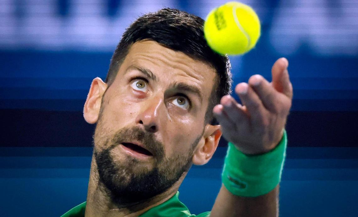 Novak Djokovic, who appears to have a stye in his eye, serves to Jakub Mensik during the Miami Open tennis men’s final at Hard Rock Stadium in Miami Gardens, Florida, on Sunday, March 30, 2025.