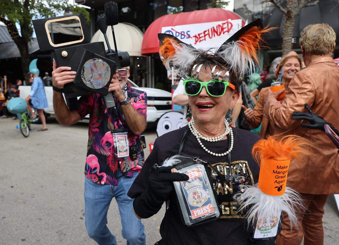 Foxy News reports from the King Mango Strut parade as camera man Alyn Pruett, and reporter Janice Pruett, made their way down the parade route as the 42nd Annual King Mango Strut - a wacky, fun-filled parade celebrating the quirks, humorous, and satirical political statements held on Sunday, January 4, 2026, in the heart of the Grove in Miami, Florida.