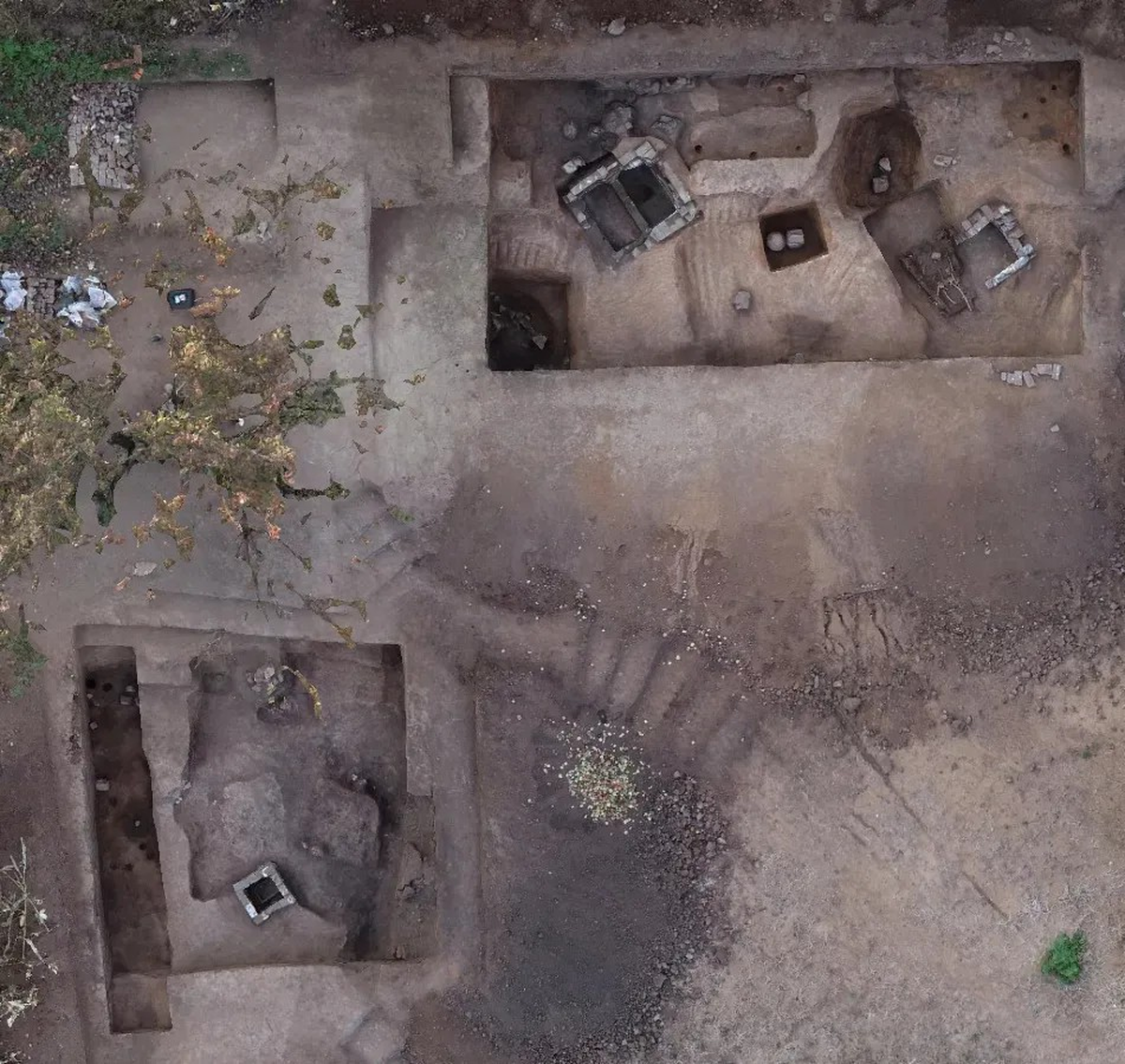 The rectangular homes are more than 2,000 years old and have evidence of everyday life, including pottery and stoves, researchers said.