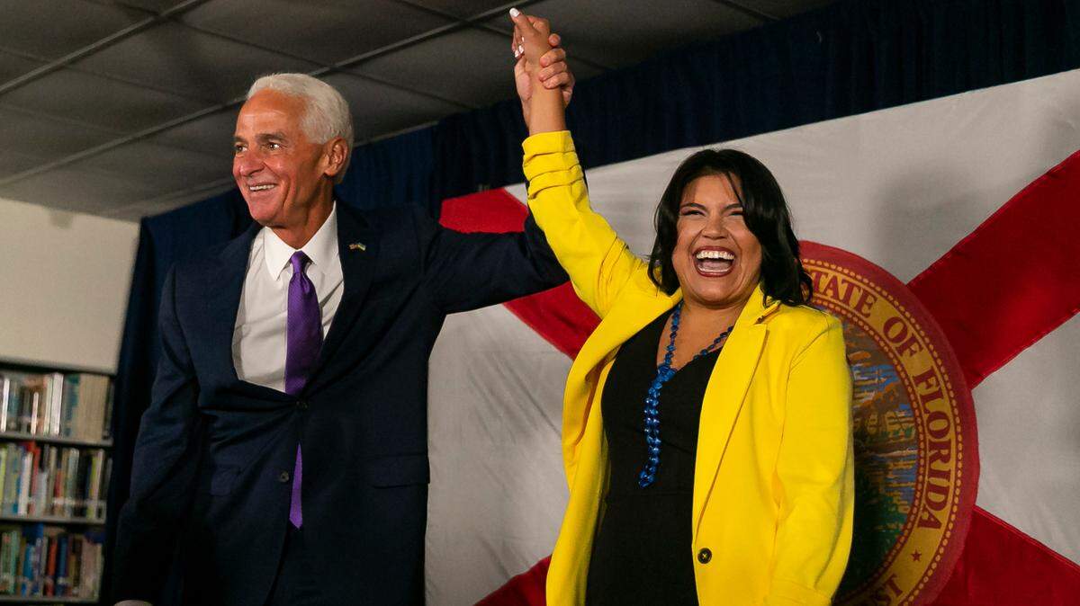 Charlie Crist, the Democratic Party’s candidate for Florida governor, and his newly announced running mate, Karla Hernández-Mats, react during a political rally at Hialeah Middle Community School on Saturday, Aug. 27, 2022, in Hialeah, Fla. Crist held the rally to announce that he selected Hernández-Mats, the president of United Teachers of Dade and a vice president of the American Federation of Teachers, as his running mate.