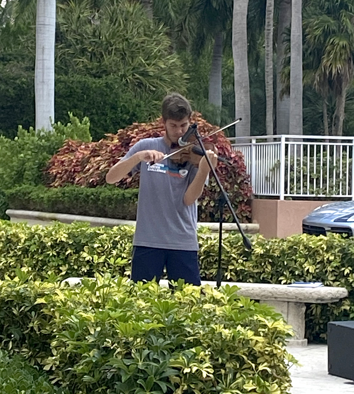 Zach Buttrick, 18, a student at Ransom Everglades School in Coconut Grove, has performed more than 60 mini-concerts in neighborhoods all over Miami since the coronvirus pandemic lockdown began in mid-March.