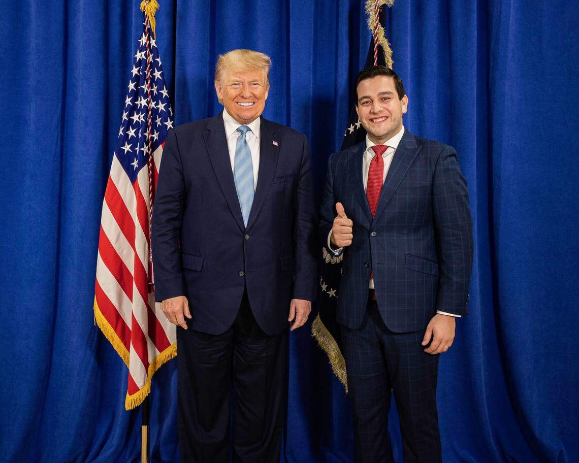 Donald Trump poses with Kevin Cabrera, director of the former president’s 2020 Florida campaign, in an undated photo. Cabrera is running for the District 6 seat for the Miami-Dade County Commission, and Trump endorsed him on May 5, 2022.