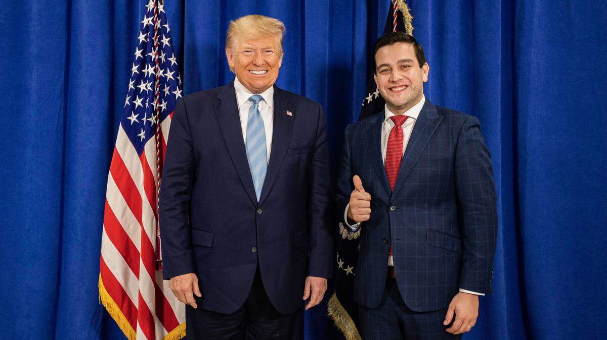 In this 2020 file photo, President Donald Trump poses with Kevin Cabrera, a Miami-Dade County commissioner who was director of Trump’s reelection campaign in Florida. Now Trump is sending Cabrera to Panama as U.S. ambassador.