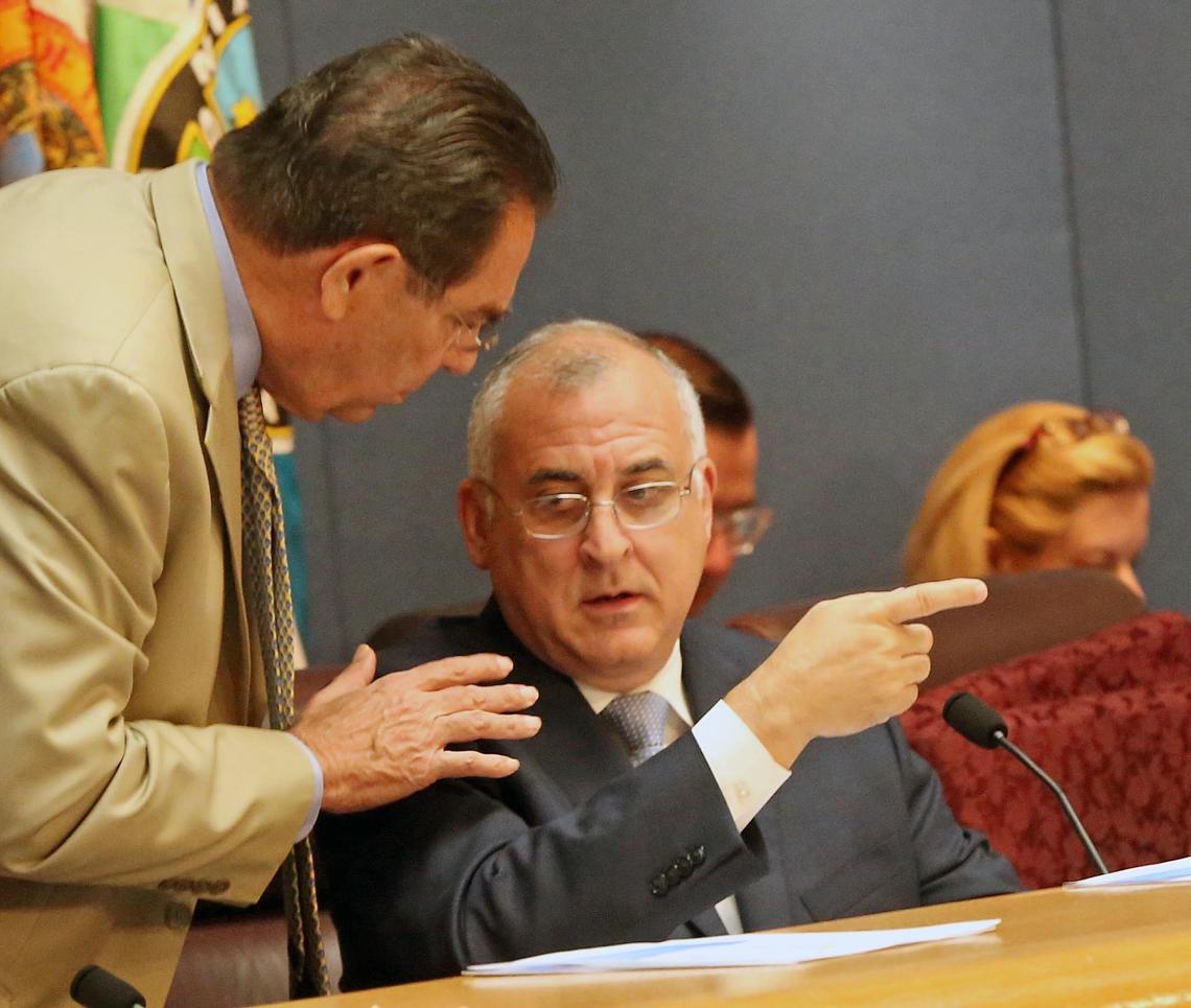 Miami-Dade Commission Chairman Esteban "Steve" Bovo, seated during an April commission meeting, is the top sponsor of legislation to bring the Cuban Exile History Museum to county-owned waterfront in downtown Miami.