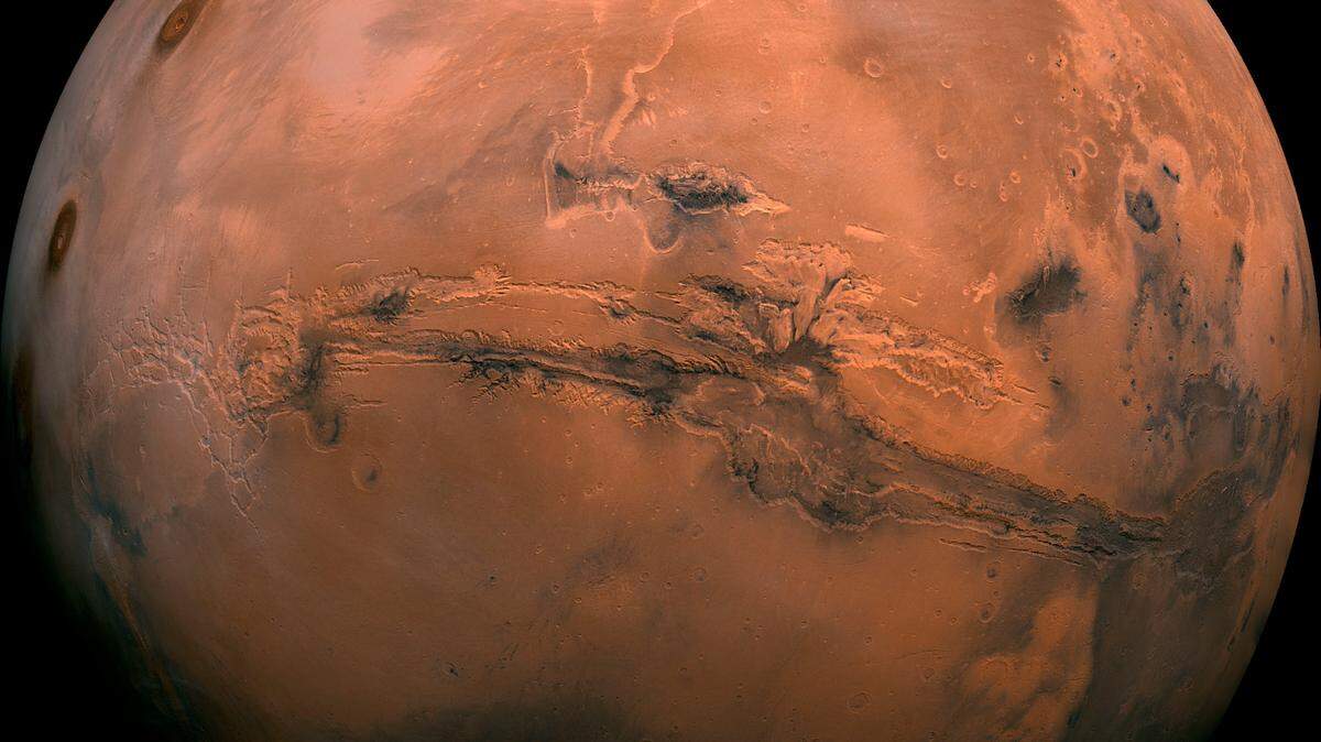 This image made available by NASA shows the planet Mars. This composite photo was created from over 100 images of Mars taken by Viking Orbiters in the 1970s. On Tuesday, July 31, 2018, the red planet will make its closest approach to Earth in 15 years. (NASA via AP)