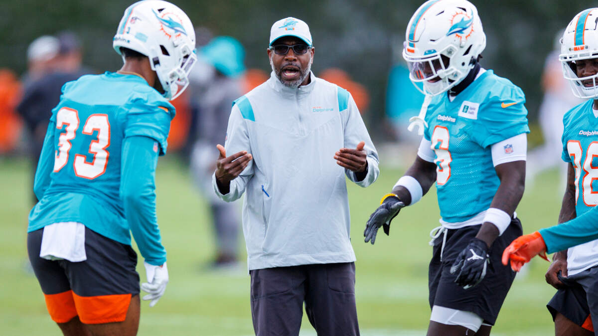 Miami Dolphins cornerbacks coach and pass game specialist Sam Madison talks to his players during the NFL football team’s organized team activities at Baptist Health Training Complex in Hard Rock Stadium on Tuesday, May 24, 2022 in Miami Gardens, Florida, in preparation for their 2022-23 NFL season.