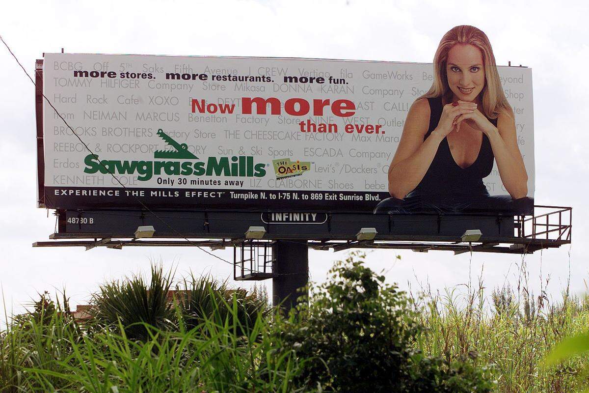 In 2001, a billboard for Sawgrass Mills mall near the new Dolphin Mall in a shopping war.