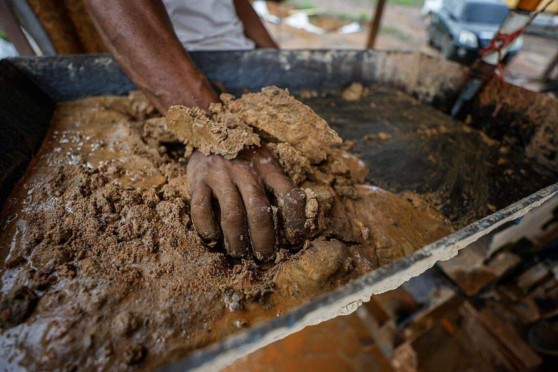 A man works at an artisanal gold mine in the town of El Dorado, Bolivar state, Venezuela, on May 25, 2025. El Dorado is part of a region christened by the government as the Arco Minero del Orinoco, which has large mineral reserves and is criss-crossed by illegal mining and organized crime, and where trade with gold dust is common currency.            