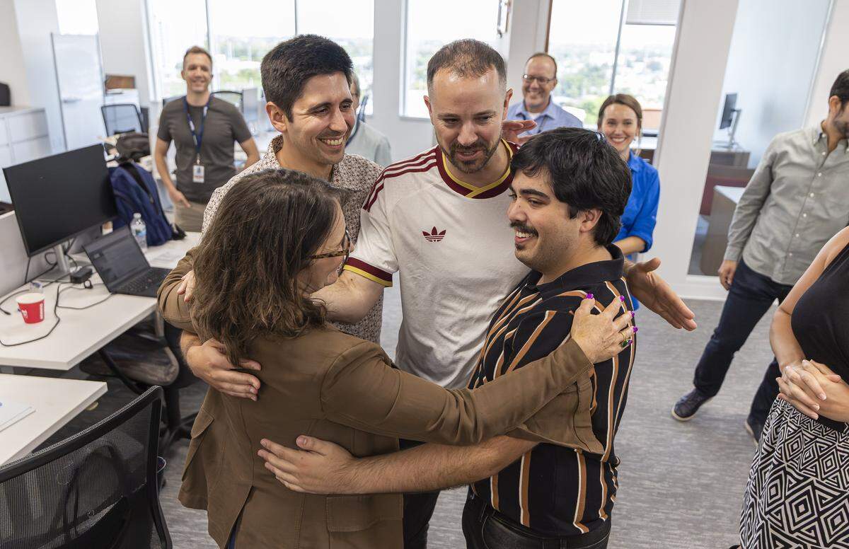 From left to right: Miami Herald reporters Brittany Wallman, Aaron Leibowitz, and WLRN reporters Danny Rivero and Josh Ceballos, celebrate after being named finalists in the Local Reporting Pulitzer Prize category at the Miami Herald, el Nuevo Herald on Monday, May 4, 2026, in Miami, Fla. They reporting focused on the deaths attributed to the Brightline trains.