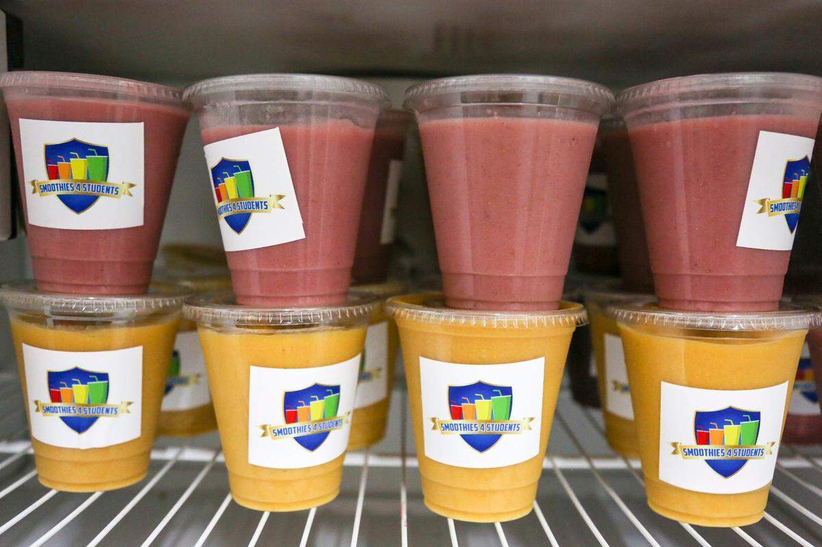 Smoothies delivered by George Caesar, a Liberty City math teacher and founder of Smoothies 4 Students are stored in a fridge at Village Free(dge), a community organization that provides food for people in the community who need it.