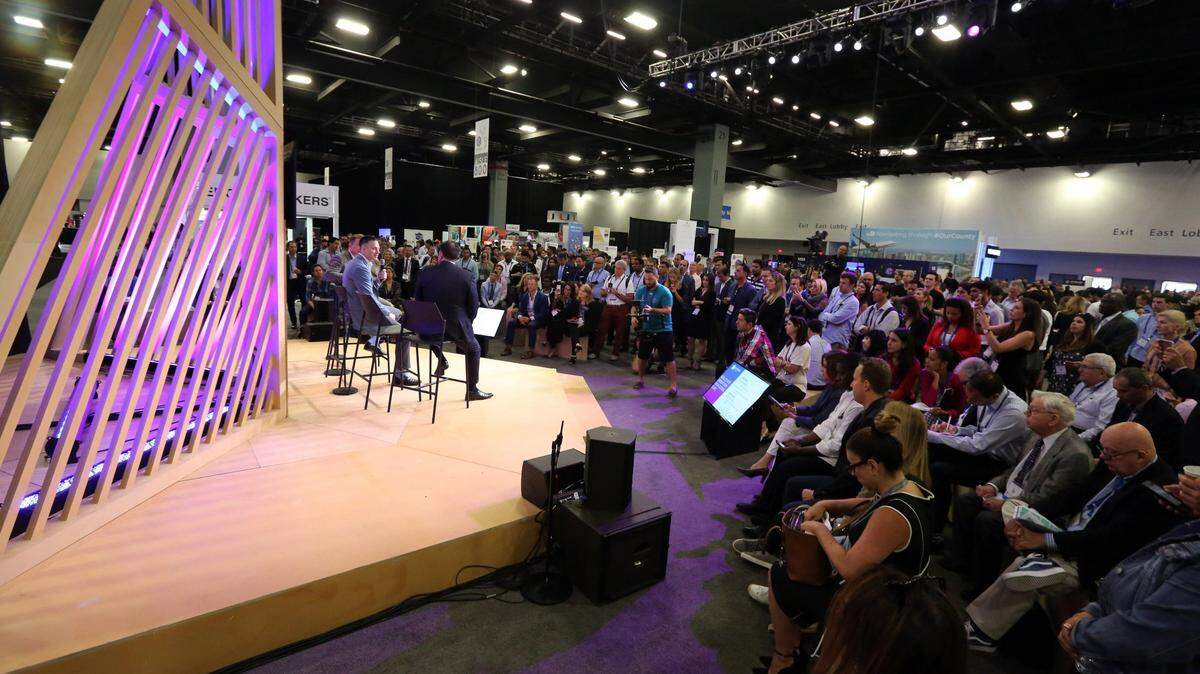 Speakers talk on the center stage during the eMerge Americas conference that took place at the Miami Beach Convention Center Monday and Tuesday , April 23-24, 2018.