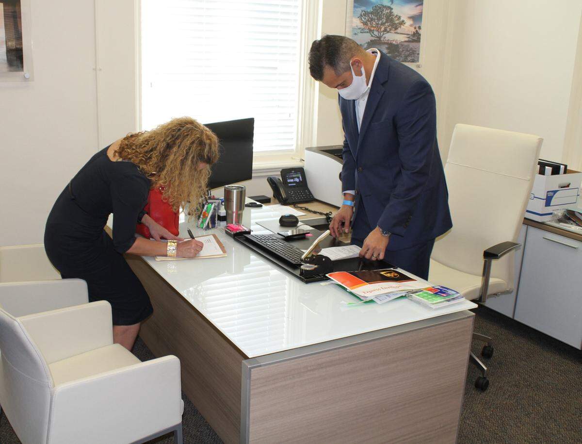 Tania Cruz-Gimenez files her paperwork to run for Coral Gables city commission.