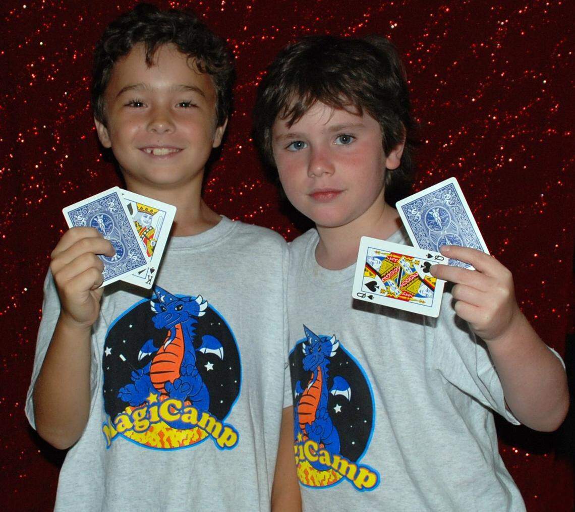 Summer campers practice card tricks at the FUNCAMPS MagiCamp. There is also Amazing Science & Space Camp, JurassiCamp, FunArts, GameTech: Robotics Camp, and GameTech Institute.