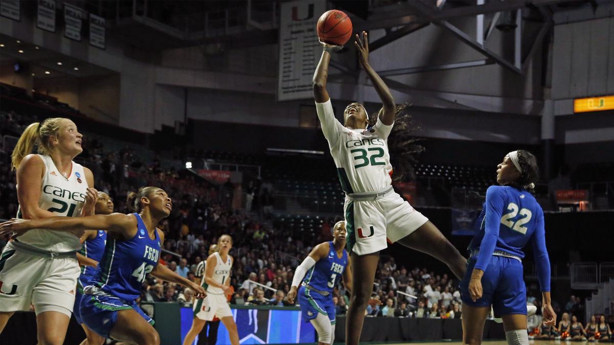 Miami Hurricanes forward Beatrice Mompremier (32) attempts to score in the first quarter on Friday, March 22, 2019. Miami’s past three basketball seasons have ended with Tournament upset losses to Quinnipiac (twice) and South Dakota State. But late Friday, the host Hurricanes held off the feisty Florida Gulf Coast Eagles 69-62.