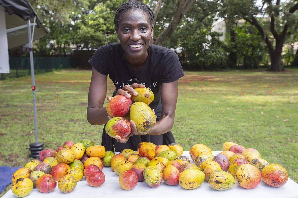 Sayblee Darsale sells mangoes at Miami’s Legion Park Farmers Market in 2024. The number of farmers markets in the city also helped Miami rank high as a foodie city.