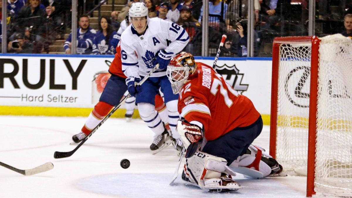 Florida Panthers goalie Sergei Bobrovsky (72) eyes on the puck as he defends the goal from Toronto Maple Leafs right wing Mitchell Marner (16) during the first period of an NHL regular season hockey game at the BB&T Center on Thursday, February 27, 2020 in Sunrise.